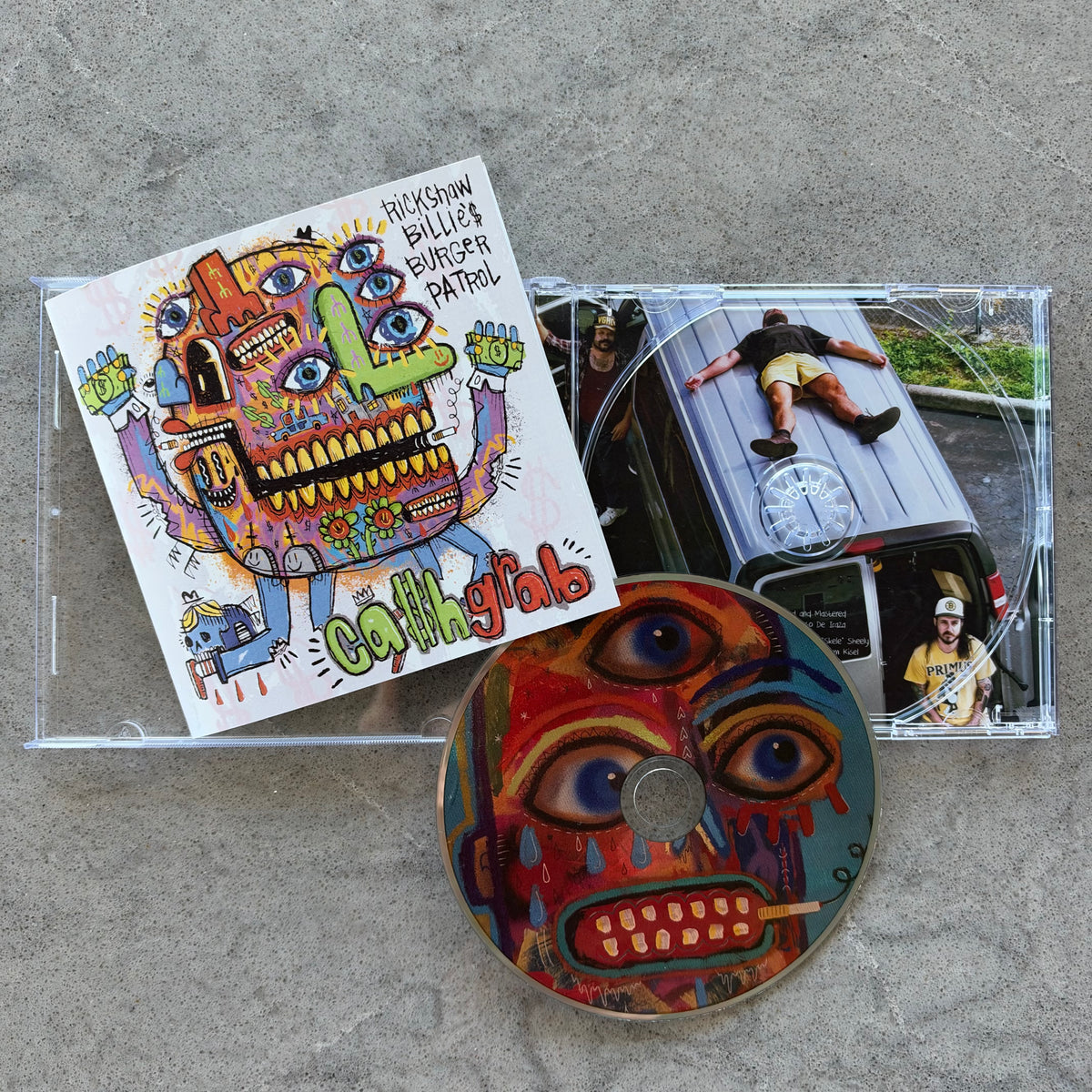 US & EU STORES! Ca$h Grab Compact Disc